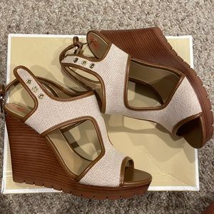 Brand new Michael Kora Gillian wedge canvas. Women's size 7